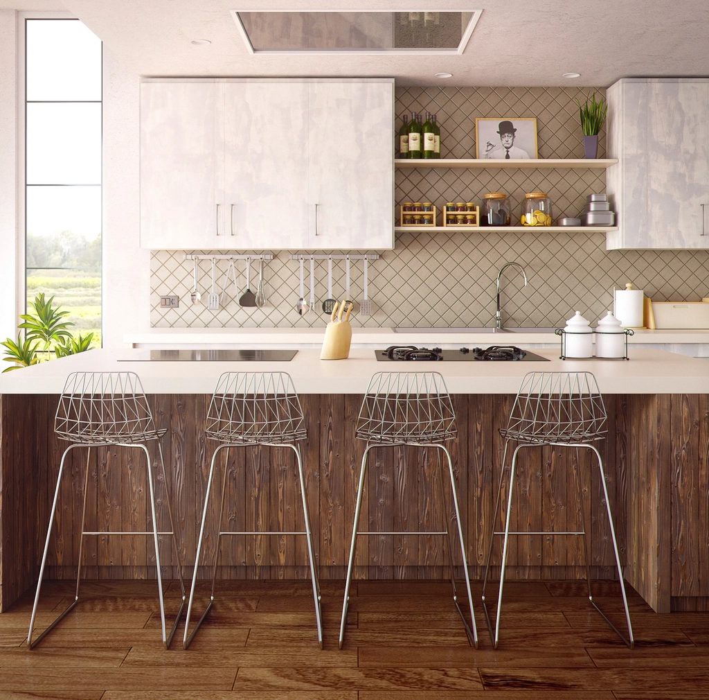 Kitchen with an island and bar stools