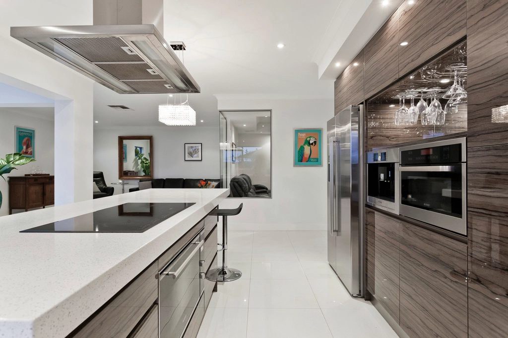 Open kitchen with a long island and stainless appliances