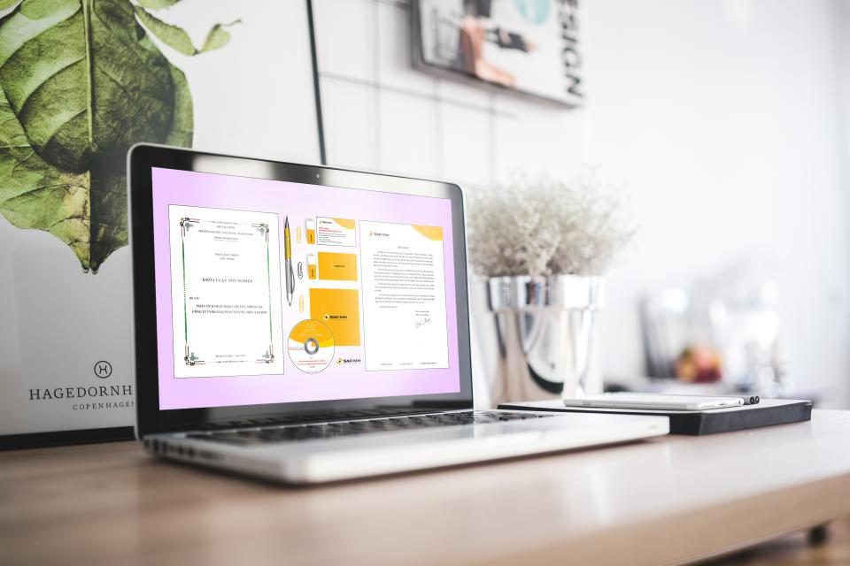 Laptop on a desk in a bright creative studio