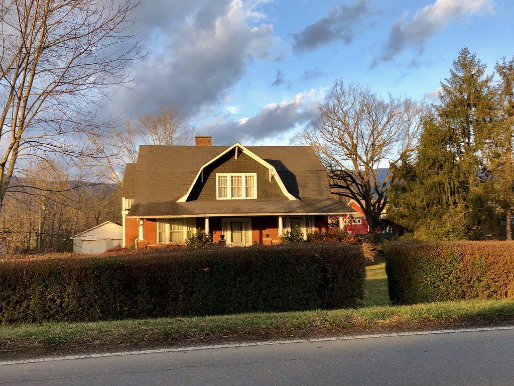 The Sterling, a gambrel-roof home at sunset